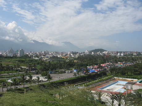 Looking back towards the city from near the waterfront in Hualien, including Meilunshan and the dome in the military base