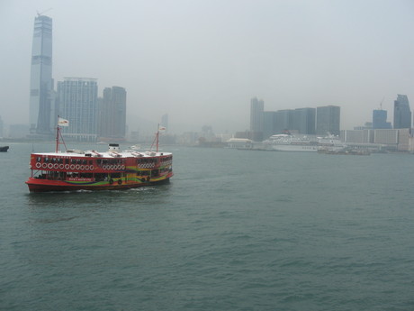 A Star Ferry with Tsui Sha Tsui in the background