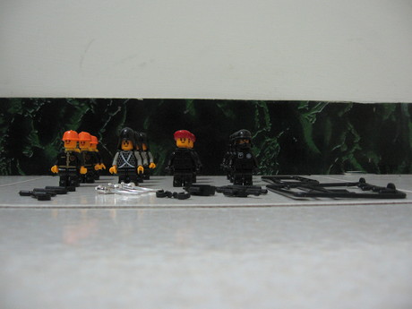 Minifigures from a pack with modern solders, older soldiers, and firemen