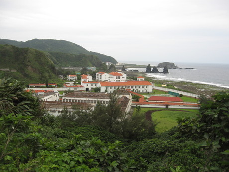 The prison complexes; Oasis Villa is at the base of the first bluff in the middle of the picture, I think the closer buildings are the Green Island Vocational Center, and the buildings at the far back are probably just a village