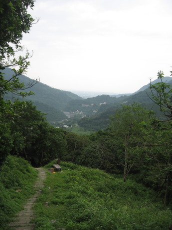 A trail in Jhihben National Forest Recreation Area; I think I established that Taitung is toward the left of the bit of coastline visible in the distance